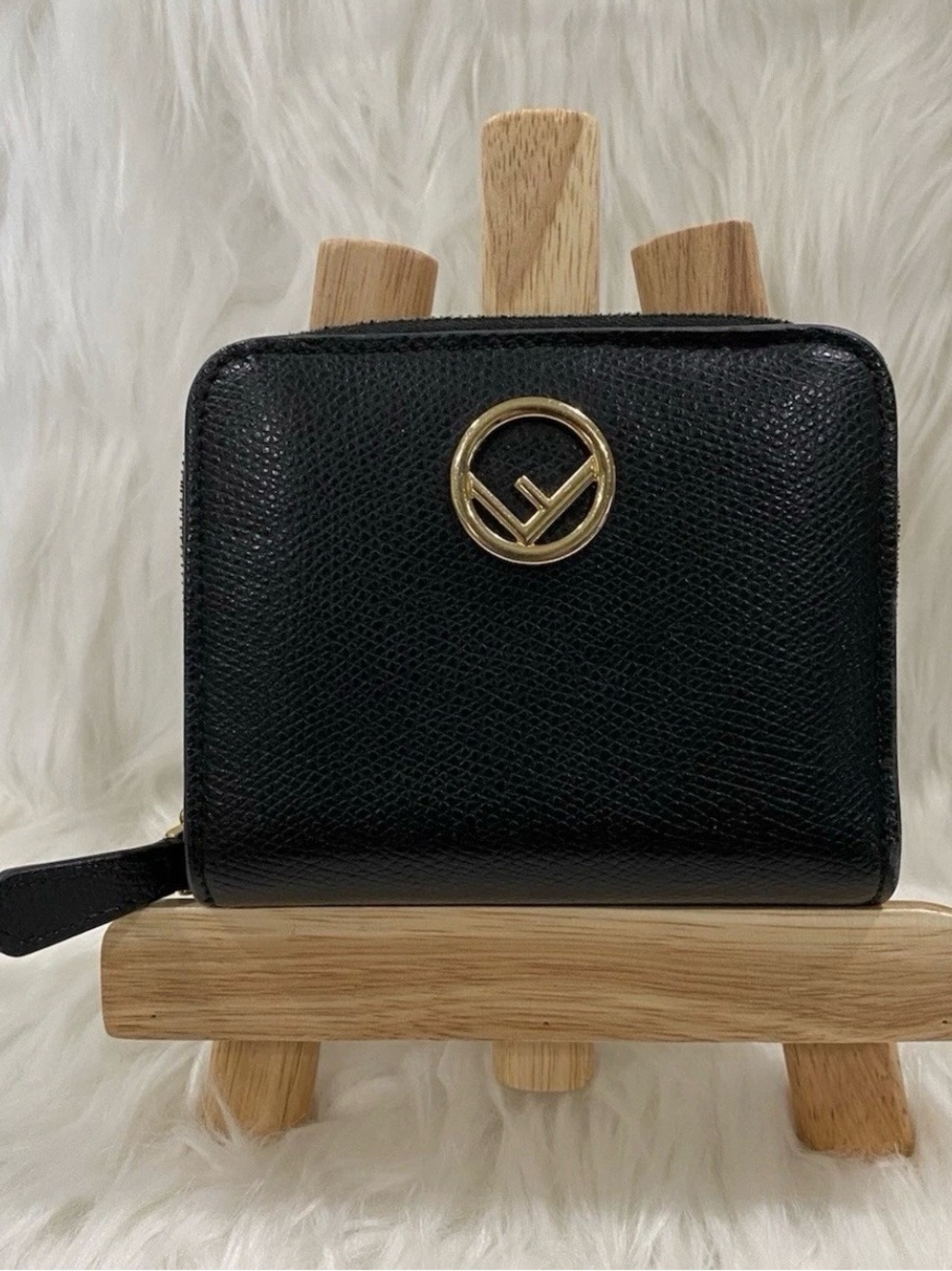 Fendi "F is Fendi" compact bifold black calfskin leather w/ gold hardware Unisex